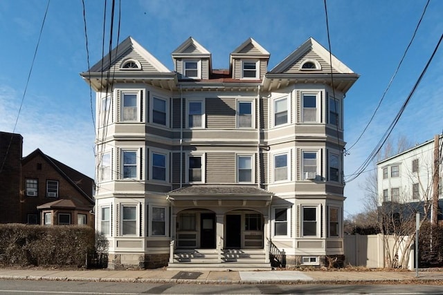 201 High St, Brookline, MA 02445 - victorian-style house featuring covered porch and fence