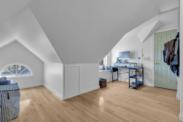 201 High St, Brookline, MA 02445 - additional living space with light wood-type flooring, vaulted ceiling, and baseboards