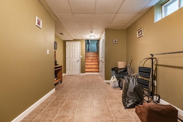 578-580 Detroit St, Fall River, MA 02721 - hall featuring a paneled ceiling, light tile patterned floors, stairway, and baseboards