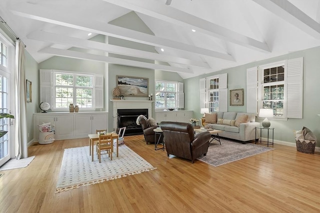 62 Waite Rd, Boxborough, MA 01719 - living room with a fireplace, light wood-style flooring, recessed lighting, and baseboards