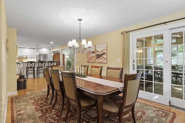62 Waite Rd, Boxborough, MA 01719 - dining area featuring a chandelier, light wood-style flooring, and recessed lighting