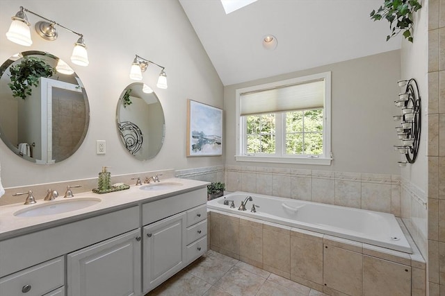 62 Waite Rd, Boxborough, MA 01719 - full bathroom featuring lofted ceiling, a garden tub, double vanity, and tile patterned flooring