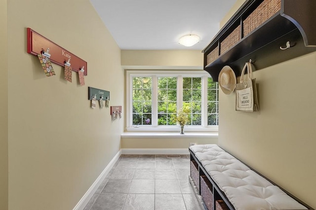 62 Waite Rd, Boxborough, MA 01719 - mudroom featuring baseboards and tile patterned flooring