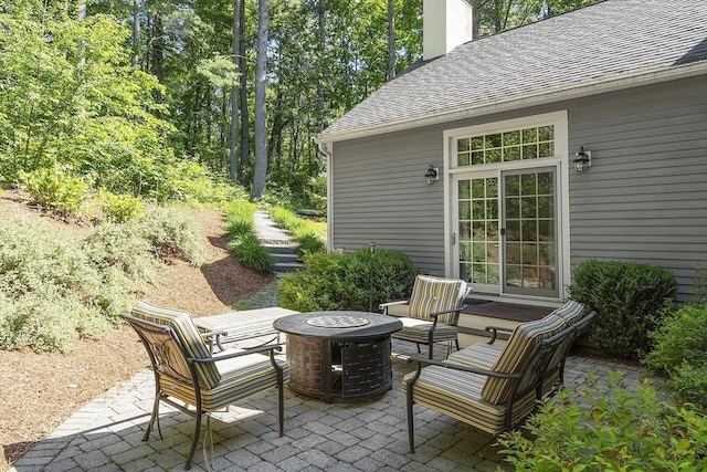62 Waite Rd, Boxborough, MA 01719 - view of patio featuring an outdoor fire pit