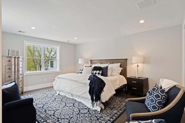 bedroom featuring visible vents, recessed lighting, and baseboards