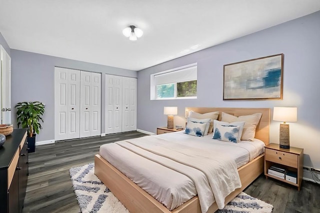 64 Main St Unit 25B, Stoneham, MA 02180 - bedroom with two closets and dark wood-type flooring