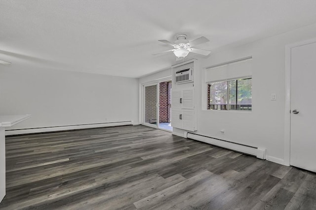 64 Main St Unit 25B, Stoneham, MA 02180 - empty room featuring a baseboard radiator, a baseboard heating unit, a ceiling fan, wood finished floors, and a wall unit AC