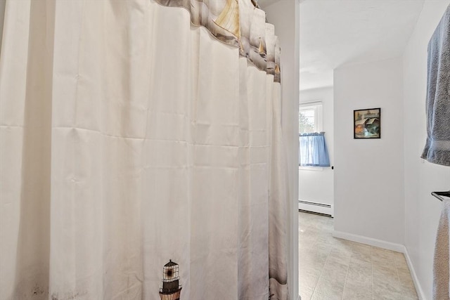 17 Lantern Ln, Leominster, MA 01453 - bathroom featuring a baseboard heating unit and baseboards