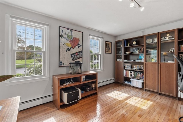 17 Lantern Ln, Leominster, MA 01453 - home office featuring a baseboard radiator and light wood-type flooring
