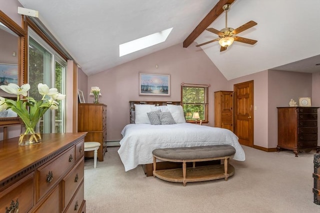 bedroom with a skylight, light carpet, a baseboard heating unit, and baseboards