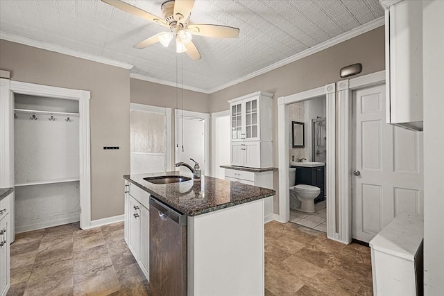 30 Whipple St, Worcester, MA 01607 - kitchen with stainless steel dishwasher, ceiling fan, white cabinets, a kitchen island with sink, and glass insert cabinets