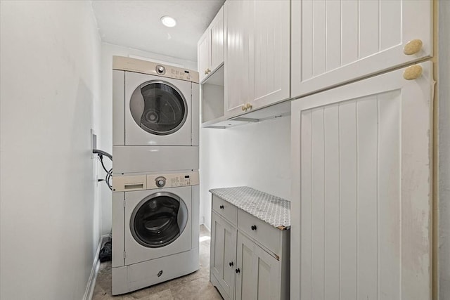 30 Whipple St, Worcester, MA 01607 - laundry room with cabinet space and stacked washer / dryer