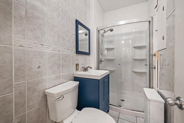 30 Whipple St, Worcester, MA 01607 - bathroom with a stall shower, vanity, tile walls, and tile patterned flooring