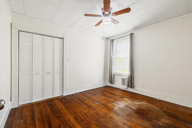 30 Whipple St, Worcester, MA 01607 - unfurnished bedroom featuring a closet, dark wood finished floors, and a ceiling fan