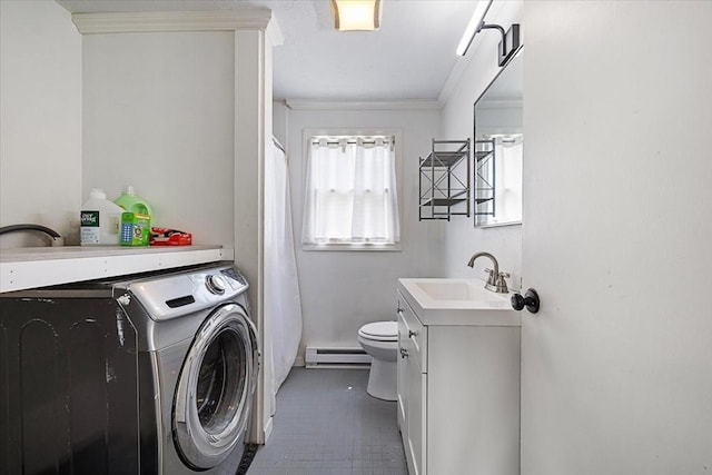 30 Whipple St, Worcester, MA 01607 - washroom with washer / clothes dryer, a baseboard heating unit, crown molding, and dark tile patterned floors