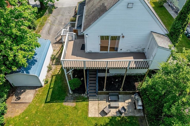 30 Whipple St, Worcester, MA 01607 - back of house featuring stairway, a wooden deck, a lawn, and a patio
