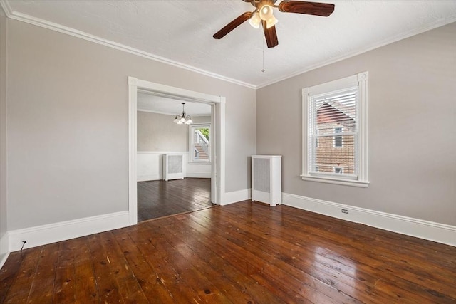 30 Whipple St, Worcester, MA 01607 - unfurnished room with hardwood / wood-style flooring, crown molding, a chandelier, and a ceiling fan