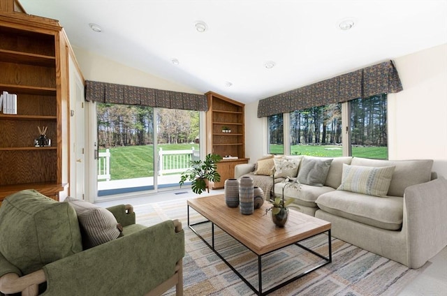 living room with lofted ceiling