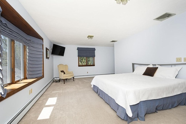 bedroom featuring a baseboard radiator, light carpet, and baseboard heating