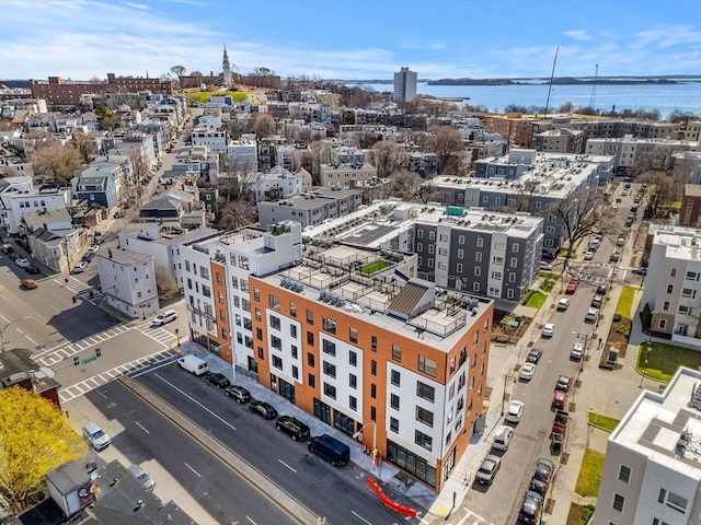 aerial view with a water view and a view of city