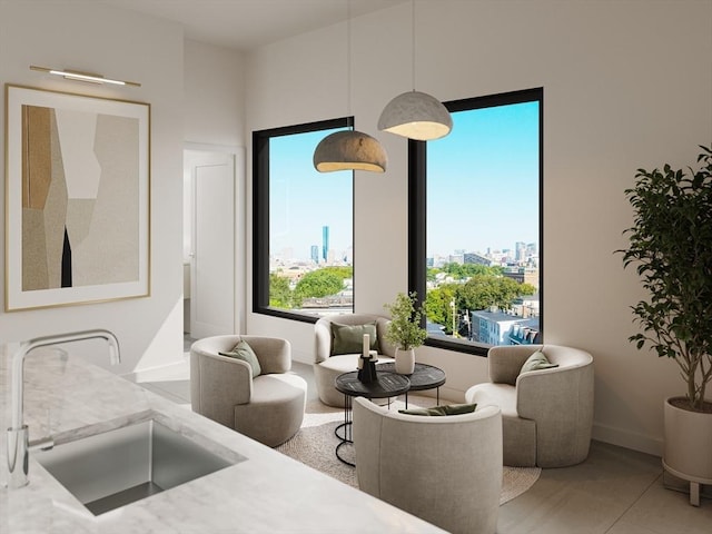 living area with a view of city and baseboards
