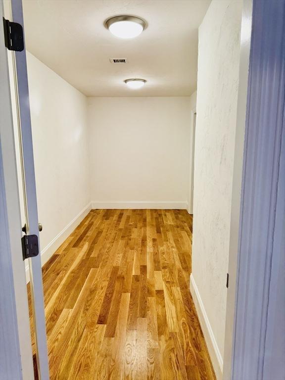 200A Randall Rd, Berlin, MA 01503 - hallway with wood finished floors and baseboards