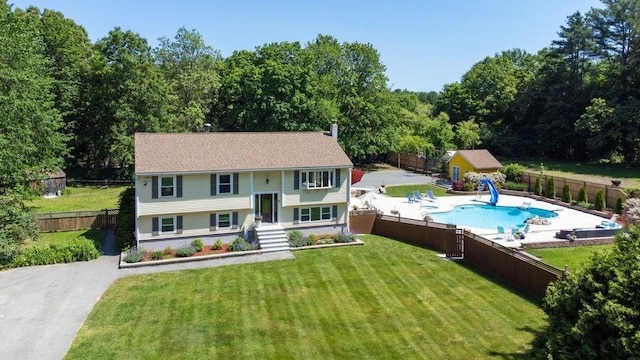6 Myers Ln, Newbury, MA 01922 - view of front facade featuring an outbuilding and a patio area