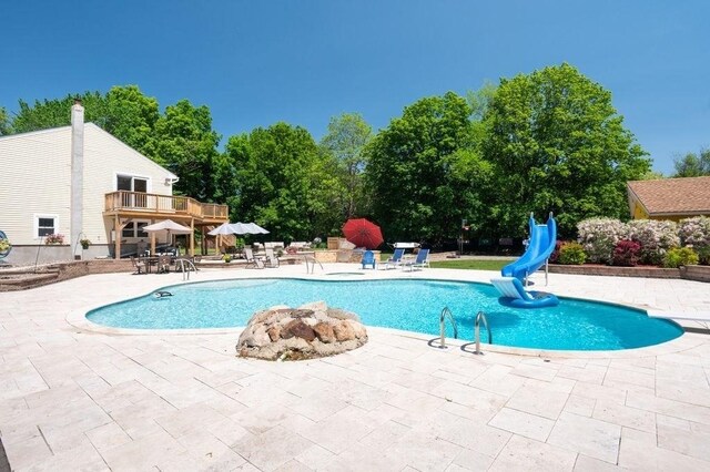 6 Myers Ln, Newbury, MA 01922 - outdoor pool with a water slide and a patio