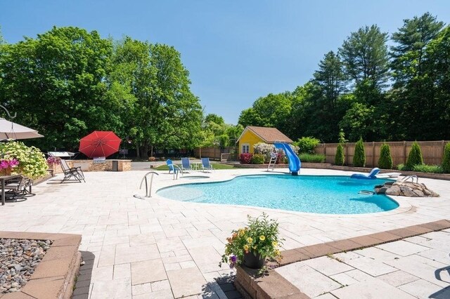 6 Myers Ln, Newbury, MA 01922 - view of swimming pool featuring a patio area and view of wooded area