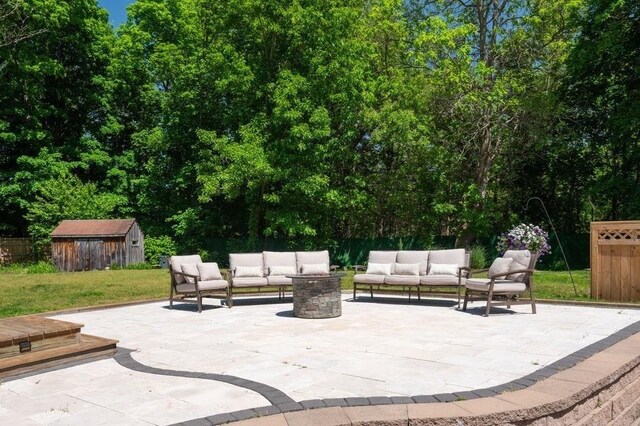 6 Myers Ln, Newbury, MA 01922 - view of patio / terrace with an outdoor living space with a fire pit