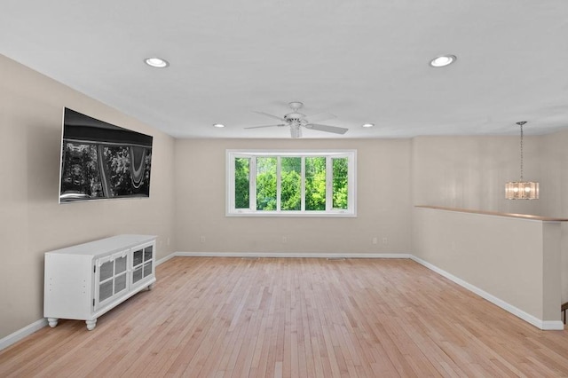 6 Myers Ln, Newbury, MA 01922 - empty room featuring wood finished floors, baseboards, a chandelier, and recessed lighting