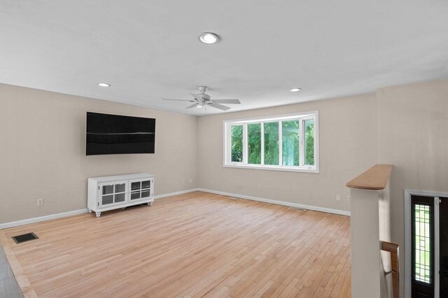 6 Myers Ln, Newbury, MA 01922 - unfurnished living room featuring baseboards, light wood-style flooring, a ceiling fan, and recessed lighting