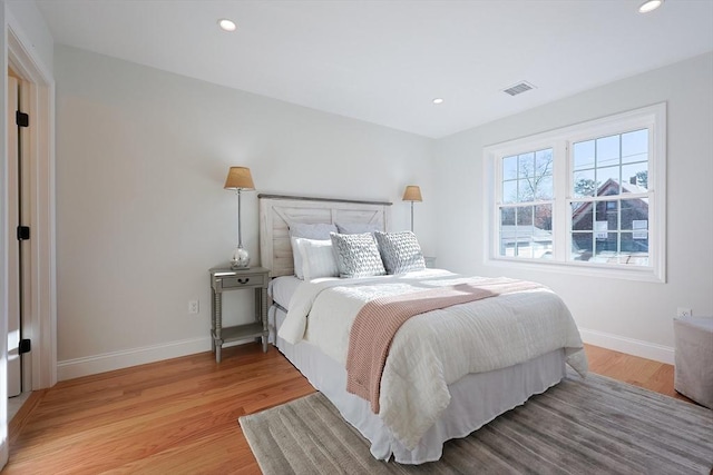 bedroom featuring light hardwood / wood-style floors