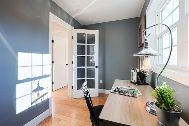 home office with light wood-type flooring