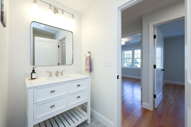 bathroom featuring vanity and hardwood / wood-style floors