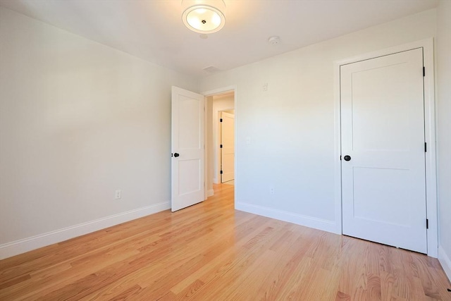 unfurnished bedroom featuring light hardwood / wood-style floors