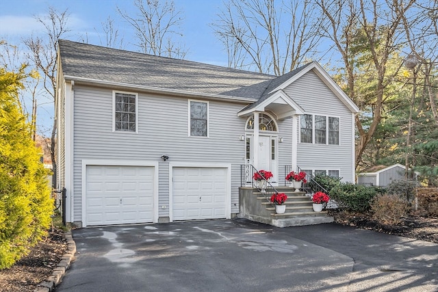 bi-level home featuring a garage