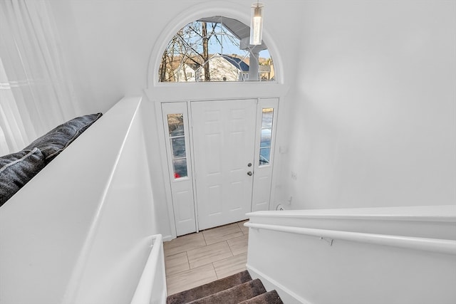 entrance foyer with a towering ceiling