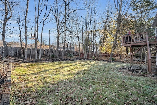 view of yard with a wooden deck