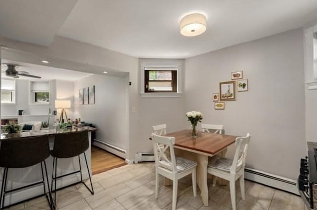 15 Trowbridge St Unit 12A, Cambridge, MA 02139 - dining space with a baseboard heating unit, healthy amount of natural light, and recessed lighting