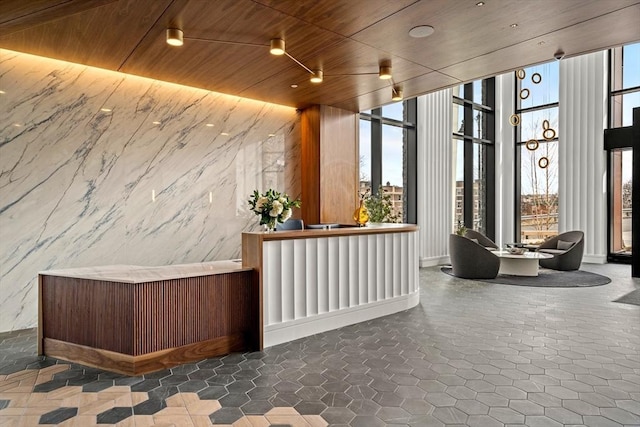 reception area featuring wood ceiling