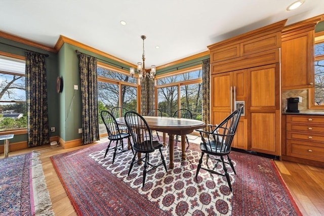 45 Joshua Rd, Wrentham, MA 02093 - dining space with healthy amount of natural light, a chandelier, crown molding, light wood-type flooring, and recessed lighting