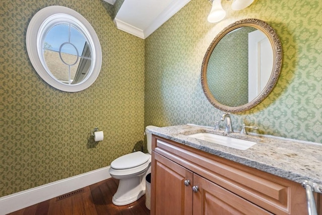 45 Joshua Rd, Wrentham, MA 02093 - half bathroom featuring wood finished floors, crown molding, and vanity