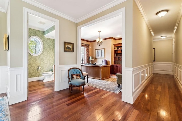 45 Joshua Rd, Wrentham, MA 02093 - hall with dark wood-type flooring, a wainscoted wall, a chandelier, and a decorative wall