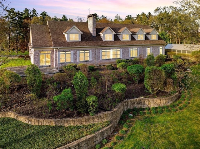 45 Joshua Rd, Wrentham, MA 02093 - view of front of property featuring a chimney and brick siding
