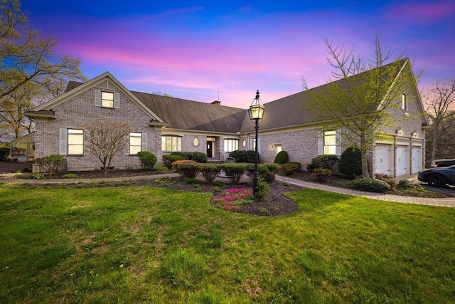 45 Joshua Rd, Wrentham, MA 02093 - view of front facade featuring a front lawn, a chimney, and brick siding