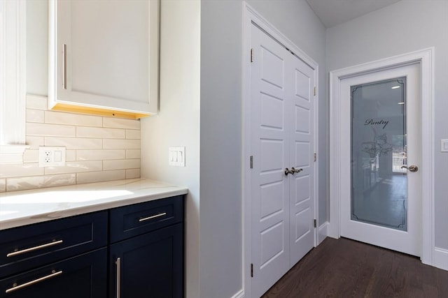 interior space with dark wood-style flooring