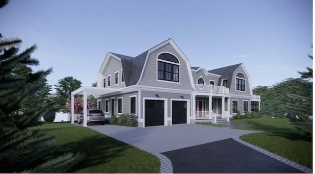 view of front of property with a garage, a balcony, and a front yard