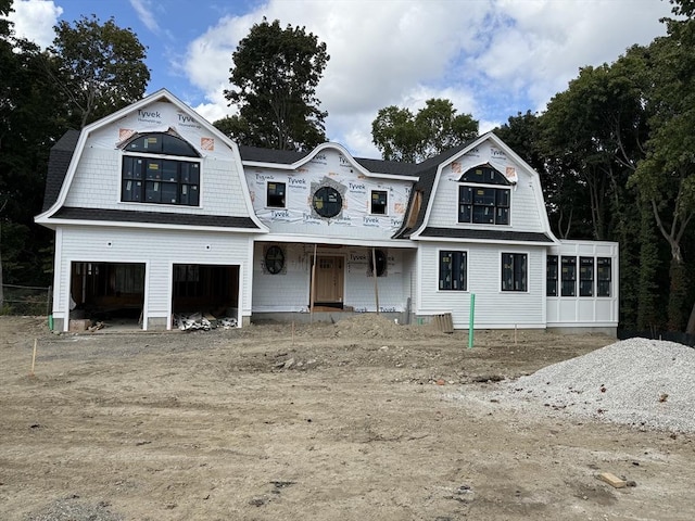 property under construction with a garage and a sunroom