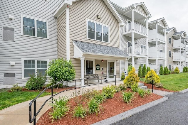 3302 Briarwood Vlg Unit 3302, Clinton, MA 01510 - view of front facade featuring roof with shingles